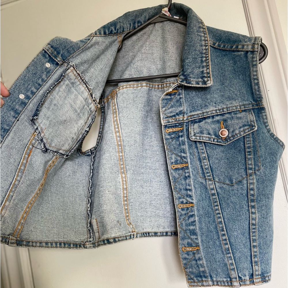 Selling my size medium Jean vest. Brand new never worn, beautiful quality
